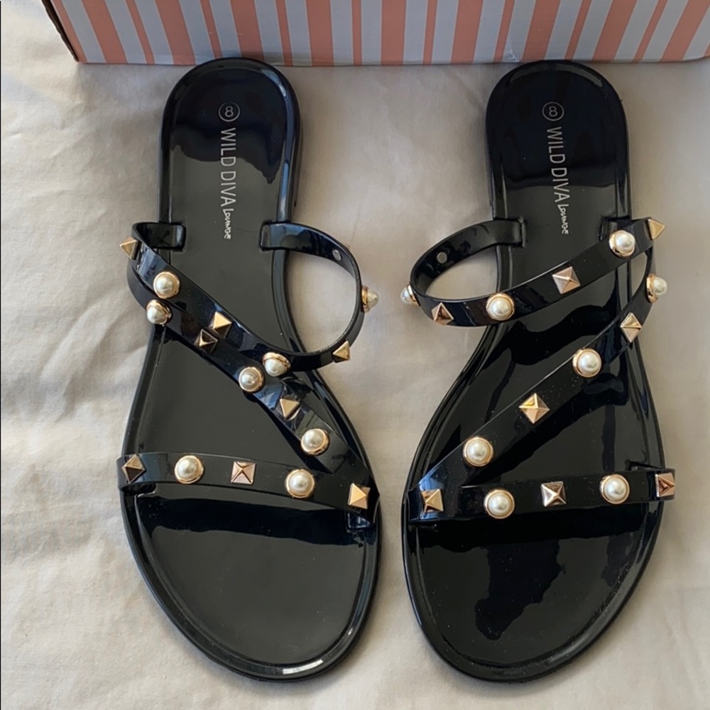 NWOT black sandals with gold embellishments